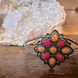 Silver tone boho cuff bracelet orange and pink detail twisted metal look
